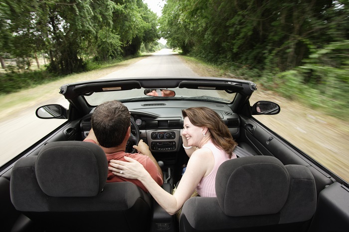 Couple In Convertible