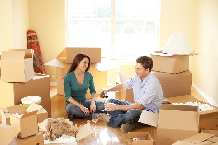 Couple Moving Into Apartment